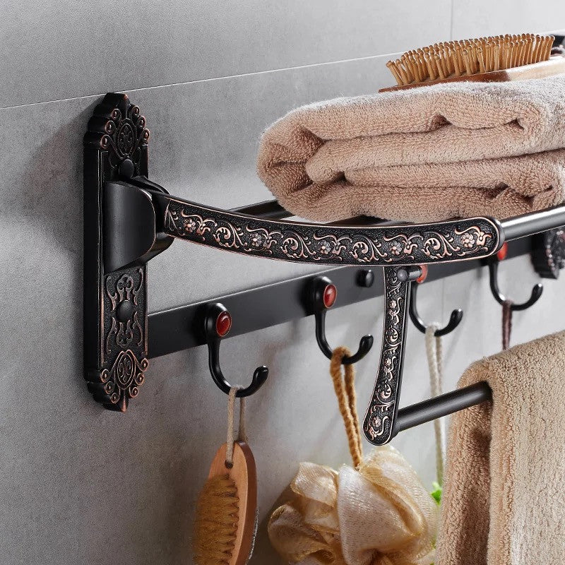 מדף בית מלון שחור וברונזה ענתיק