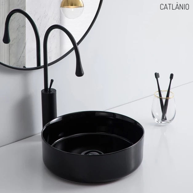 כיור מונח חרס עגול שחור מבריק מבית CATLÀNIO